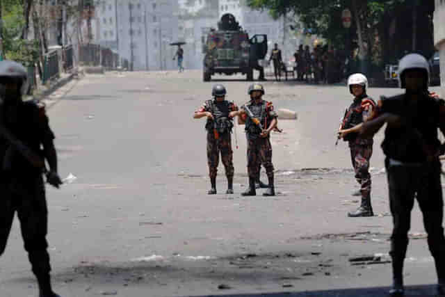 Army soldiers enforcing the curfew on the streets of Dhaka